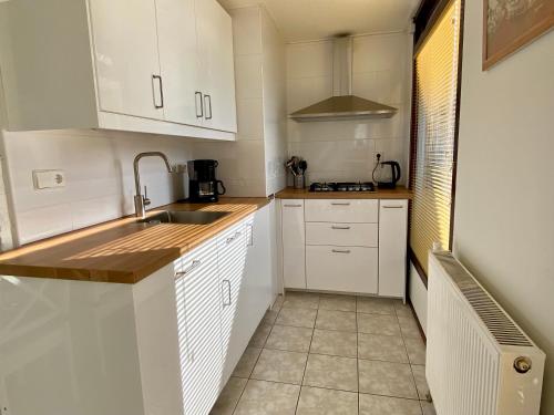 Noordzeehuisje in Шаген