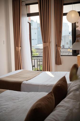 Triple Room with Balcony room in Dori Homestay