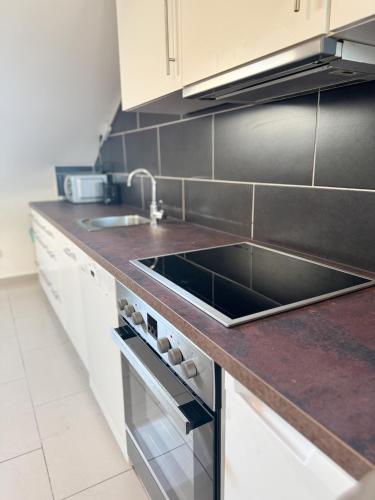 廚房, Moderne DG Wohnung in Linkenheim in 埃根斯泰因-列奧波德港