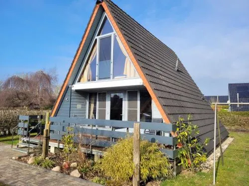 Nurdachhaus ROTER SAND in Butjadingen, Deutschland