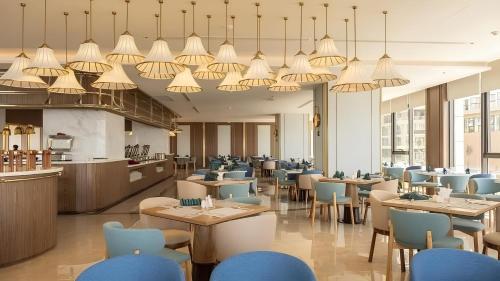 Mandala Oceanfront Driftwood Resort - 레스토랑