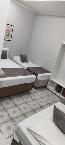 Standard Triple Room room in Hotel Tiquatira - Zona Leste
