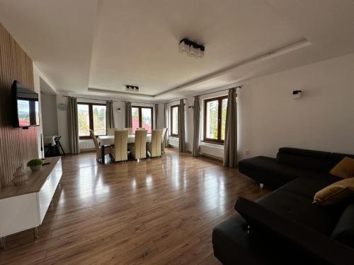 Közös társalgó / TV, Gyopár Panzió & Kulcsoház (Gyopar Panzio & Kulcsohaz) in Marosfő