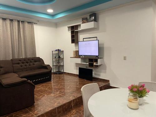 Lounge/area TV in comune, Habitación via hacia Playa La Barqueta (Habitacion via hacia Playa La Barqueta) in Palo Grande