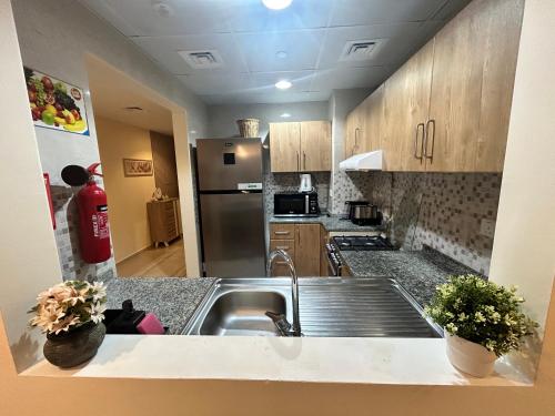 Deluxe 1BHK Apt in JVC, Self check in ! in Jumeirah Village Circle