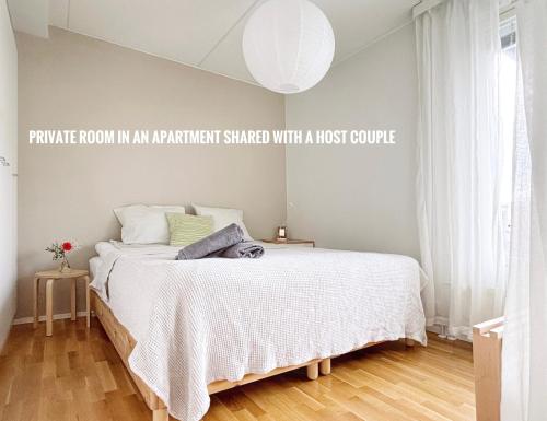 King-size bed private room in shared apartment near Sello