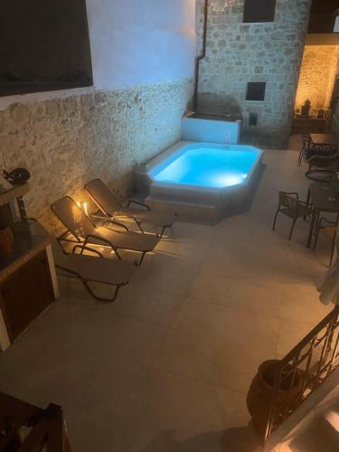 Swimming pool, Asmani Apartments with pool in Gorgolaini
