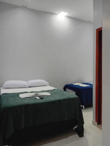 Quarto suíte 8, cama casal1, cama solteiro 1 (Quarto suite 8, cama casal1, cama solteiro 1) near สนามบินมาราบา