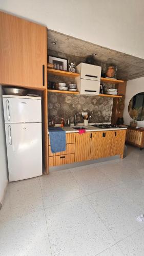 ห้องครัว, Serene Escape in Porto Madeira in รุยวาซ