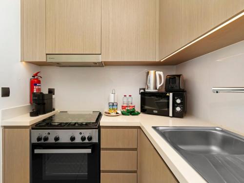 Luxe 1BR 5 mins to Dubai Mall and Burj Khalifa, Dubái (foto 9)