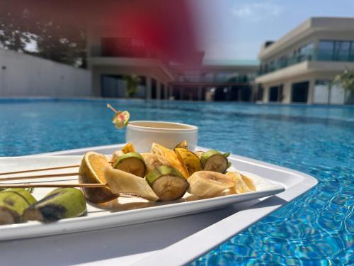 Aliments i begudes, Madigane Residence Assinie in Assinie-Mafia