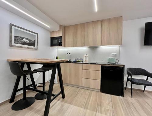 廚房, El Somni de Paqui Apartamentos Boutique Only Adults in 阿爾法法拉