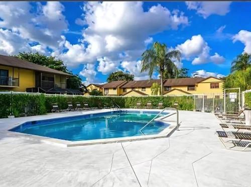 Spacious 4BR Miami Townhome with Communal Pool