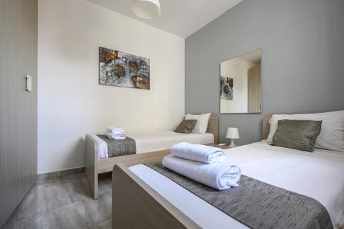 F11 Room 2, Private Room two single beds shared bathroom in shared Flat, Msida (Foto 4)