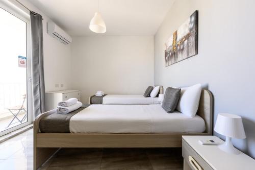 F11 Room 3, private Room two single beds shared bathroom in shared Flat, Msida (photo 7)