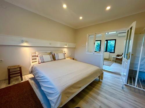 Attalos Suites Hotel - Tap to explore photos