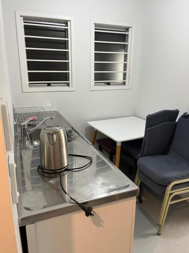 3 single bed and 2 double sofa beds Serviced Studio, Suite 7, Auckland (Foto 5)
