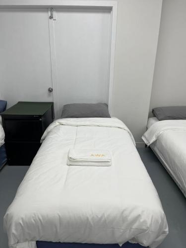 3 single bed and 2 double sofa beds Serviced Studio, Suite 7, Auckland (Foto 6)