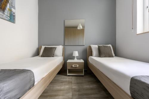 F9 Room 2, Private Room two single beds shared bathroom in shared Flat, Msida (Foto 6)