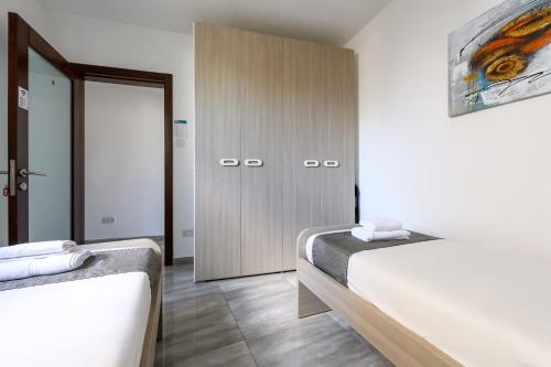 F9 Room 2, Private Room two single beds shared bathroom in shared Flat, Msida (Foto 7)