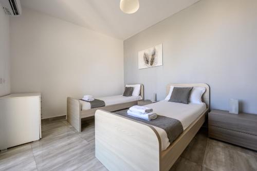 F9 Room 3, Private Room two single beds with shared bathroom in shared Flat, Msida (fotografie 10)