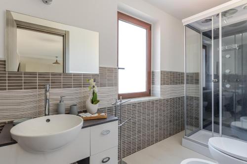 Attico180 - Attico in centro con Terrazza - Wifi e Netflix, Oristano (fotografie 7)