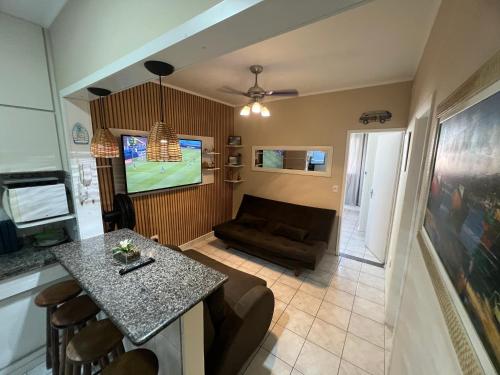 Apartamento Praia Grande Vila Mirim a 50 metros do mar in โนวามิริง