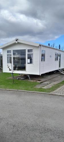 Arual Caravan Manor House Park. Allonby, Cumbria - Tap to explore photos