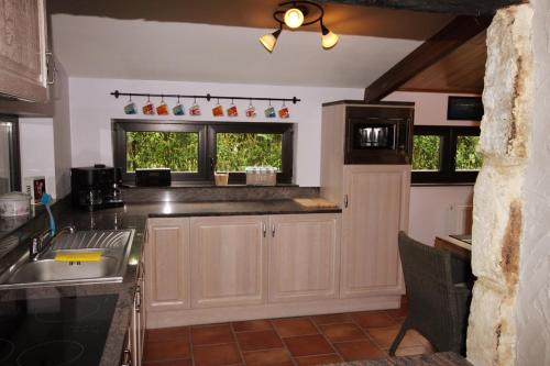 Cocina, Gite 1815 avec sauna privatif in Waterloo