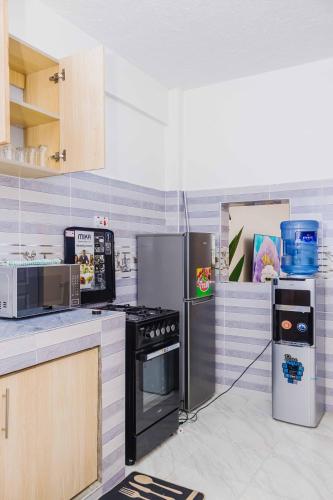 Cuina, Urban suites 2 bedroom Master ensuite holiday rental nanyuki in Nanyuki