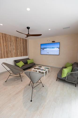 zonă comună salon/TV, SUUT Hostal Boutique in Playa del Carmen