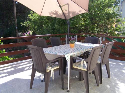 Three-Bedroom Apartment room in Apartments Maja