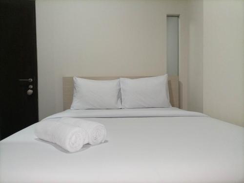 1BR with Cozy Design at Uttara The Icon Apartment By Travelio, Kejayan (fotografie 10)