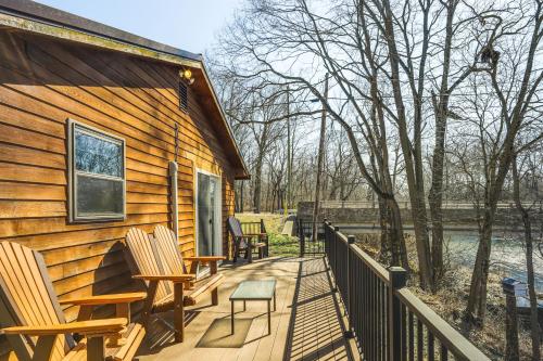 Riverfront Covington Cabin with Deck and Fire Pit!