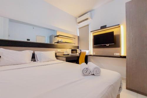 Minimalist Studio Apartment (No Kitchen) at Aeropolis Residence By Travelio, Tangerang