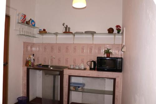 مطبخ, Ayubo Villa Ruby Room in جا-إيلا