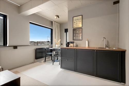 Kitchen, Apartment by the sea in the heart of Hafnarfjorður in Hafnarfjordur