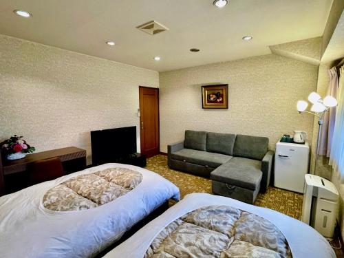 Triple Room with Shared Bathroom