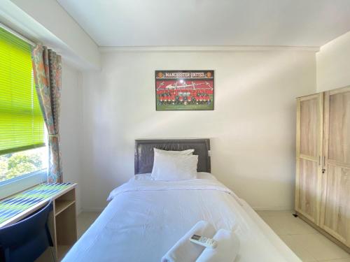 Modern Look 1BR Apartment at Parahyangan Residence near UNPAR By Travelio, Bandung