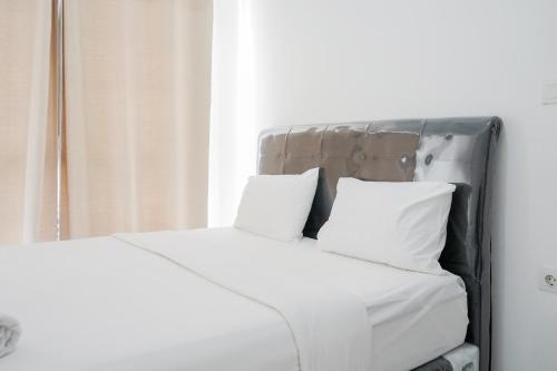 Comfort and Modern 1BR Casa De Parco Apartment By Travelio, Tangerang