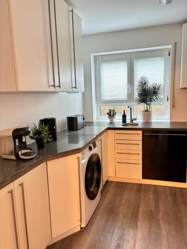 廚房, Stilvolle Einliegerwohnung mit Boxspringbett in 巴本豪森