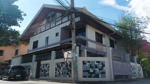 Entrance, Spacious 3-Floor  6-BR Home, Pool, BBQ, KTV, WIFI near Davao Butterfly House