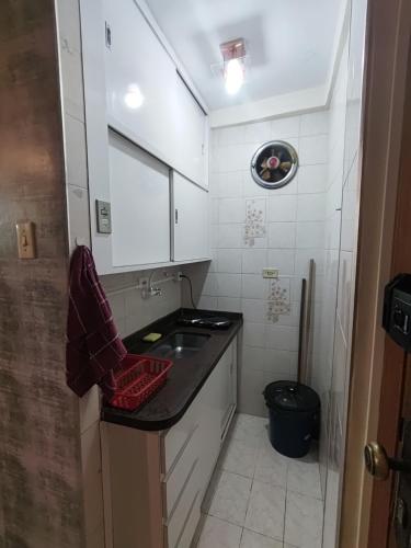 Apto central com estacionamento