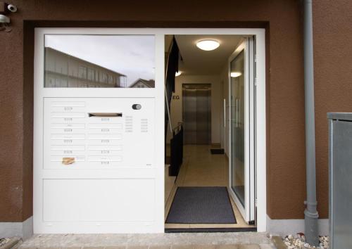 مدخل, BeSSa Homes Deluxe Apartment 6 Personen Klima Garten King Size Betten in Freilassing