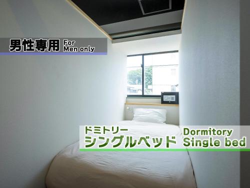 Single Bed in Male Dormitory Room