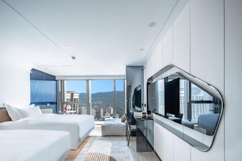 Peninsula River View Twin Room room in Chongqing Indition High-Rise Hotel (Jiefangbei Raffles Store)