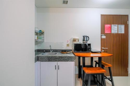 Best View 2BR at Transpark Cibubur Apartment with Sofa Bed By Travelio