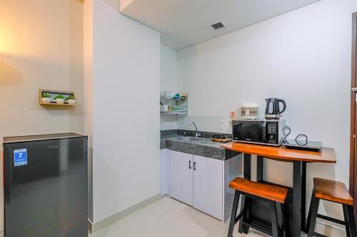 Best View 2BR at Transpark Cibubur Apartment with Sofa Bed By Travelio