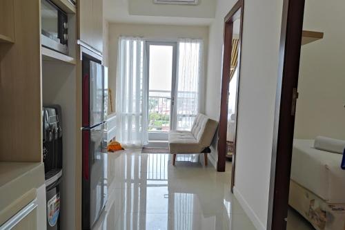 Simply & Clean 2br Vida View Makassar By Travelio - Makassar