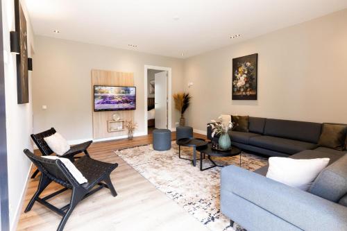 Veluwe Villa met Binnenzwembad & Wellness | 12 personen | Rolstoelvriendelijk in เอสโชเทอร์ เฟลด์